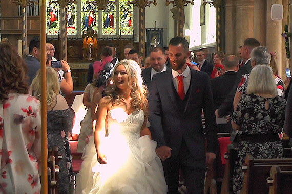 A happy walk down the aisle, in a still from a Lundscapes video